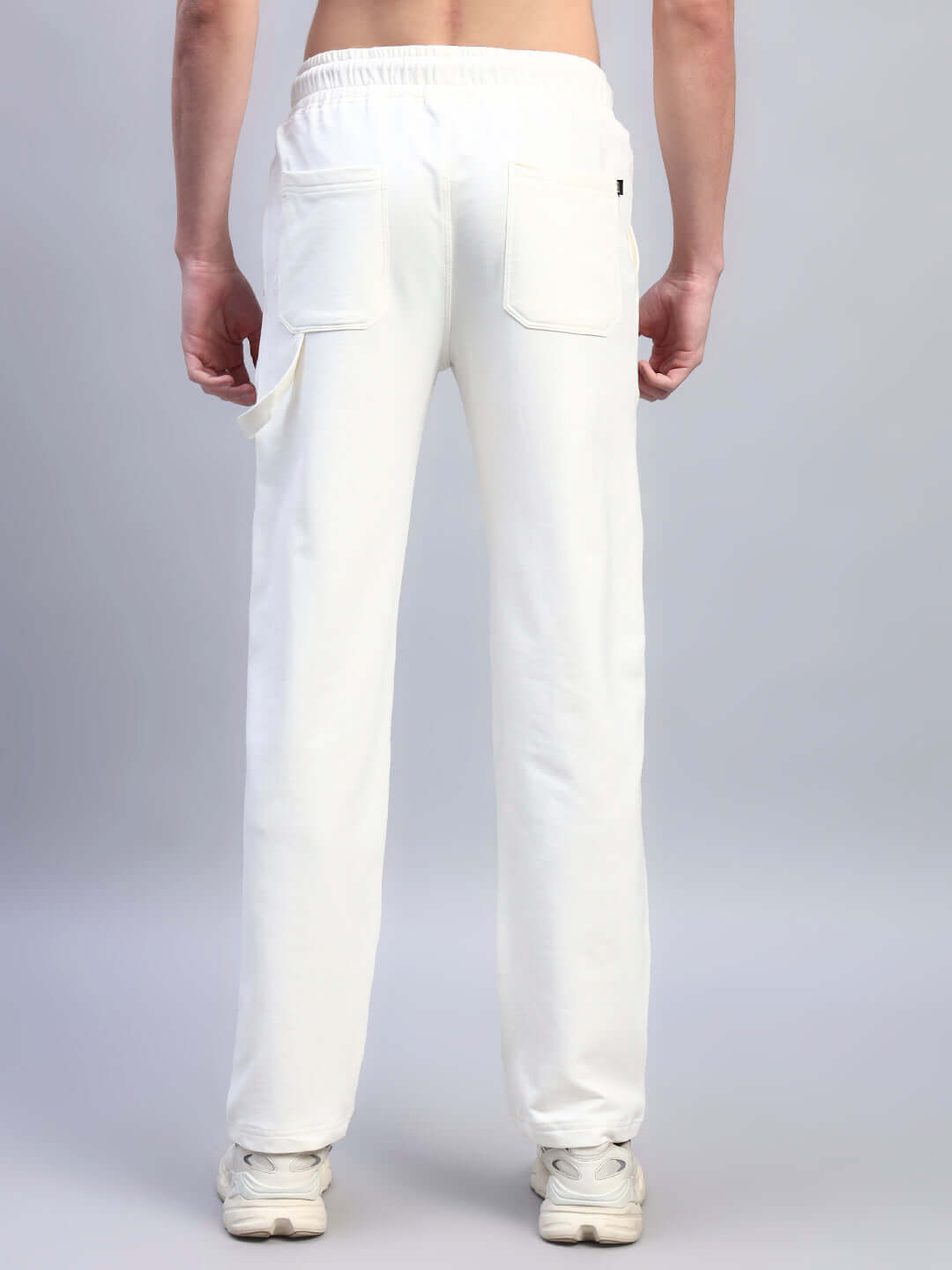 Back view of REGULUS RELAXED-FIT JOGGERS WHITE showcasing pockets and elastic waistband.