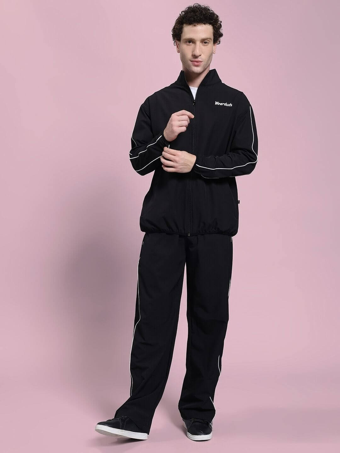 Model wearing RELIGHT RELAXED FIT CO-ORD SET BLACK, showcasing comfort and style with thermal-regulating fabric.