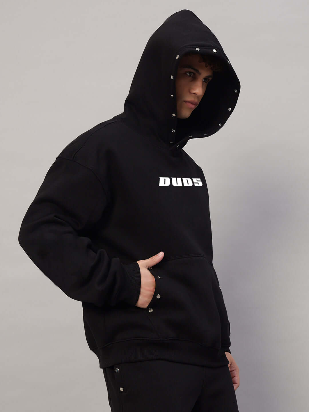 WEARDUDS RIGID FLEECE HOODIE BLACK worn by model, side view