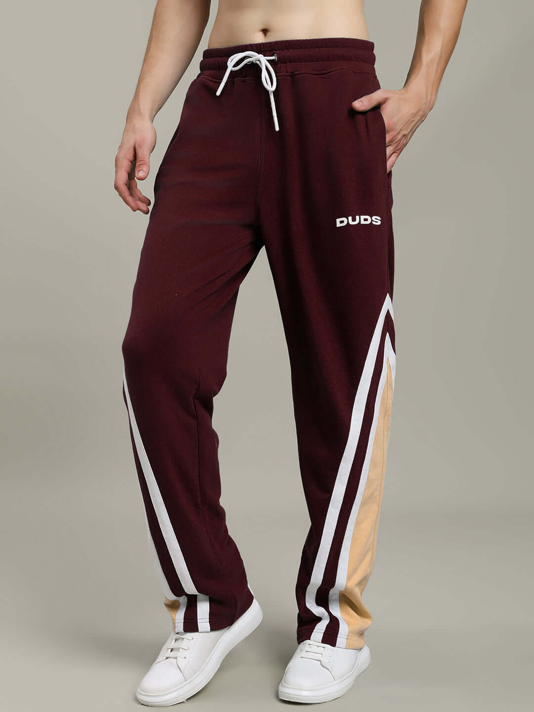 RIO ONE Relaxed Fit Brown Joggers by DUDS shown with white sneakers. Made to order by skilled tailors, available with custom fit option.