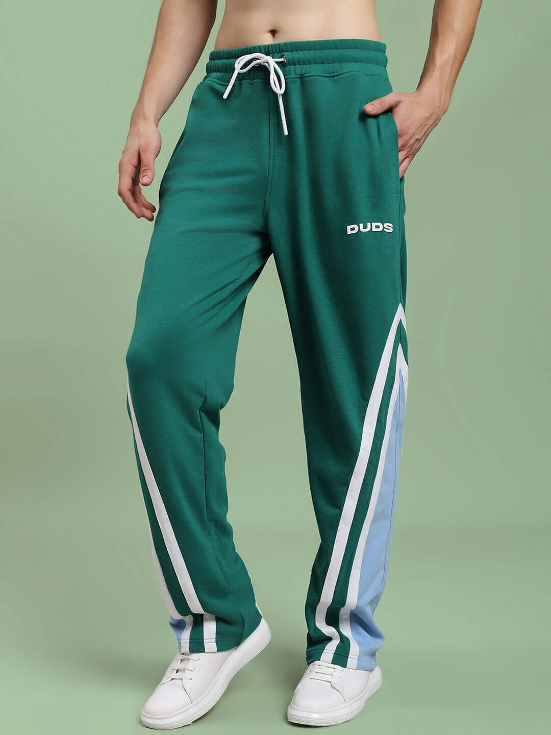 Model wearing RIO ONE RELAXED FIT JOGGERS TEAL GREEN with a bold style and comfortable fit, perfect for modern athleisure fashion.