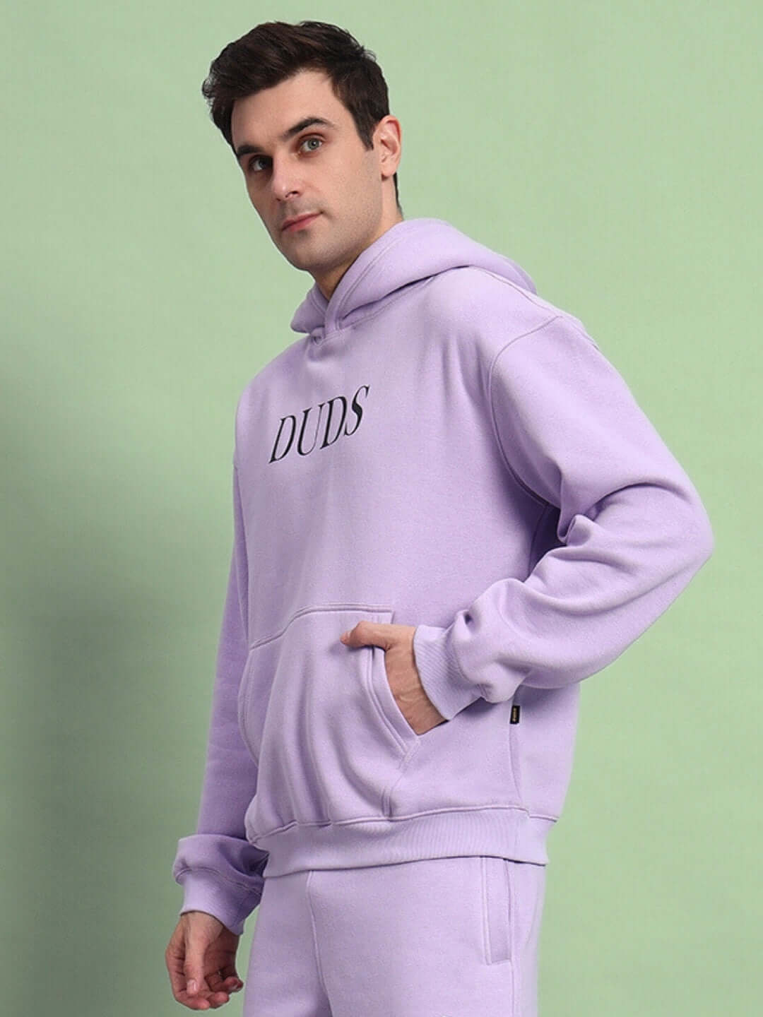 Model wearing WEARDUDS RITZY FLEECE HOODIE LILAC, showcasing comfortable fit and stylish design.
