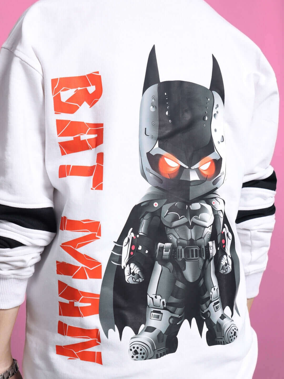 White oversized sweatshirt with cartoon superhero design and red lettering, suitable for boys and girls. Made from premium cotton blend.