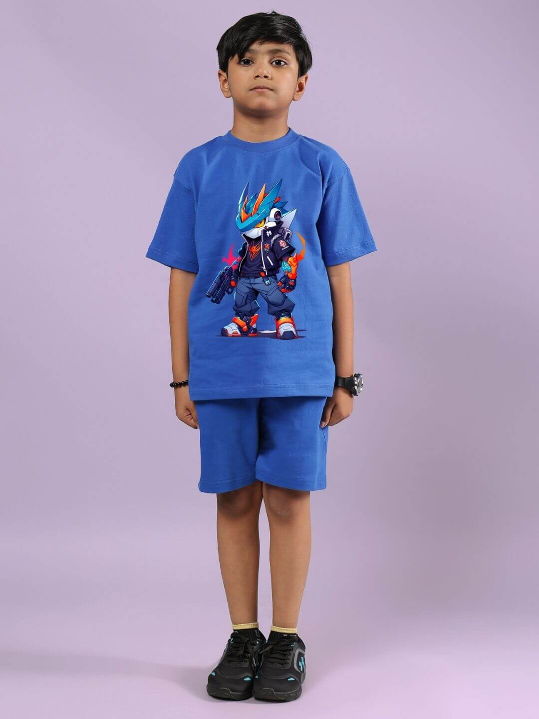 Child wearing Robo Super blue co-ord set with graphic T-shirt and matching shorts, suitable for boys and girls, made from cotton blend fabric.