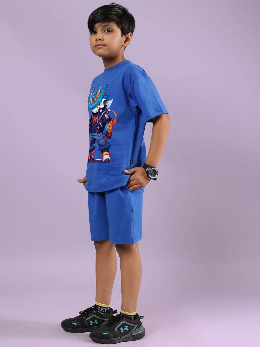 Child wearing Robo Super Co-ord Set in blue with graphic T-shirt and shorts, showcasing comfortable and breathable kids' fashion.