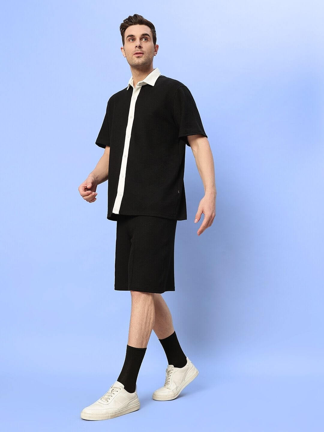 Model wearing black Robson Co-Ord Set made from waffle fabric, 100% cotton, relaxed fit, ideal for casual outings, cold machine washable.