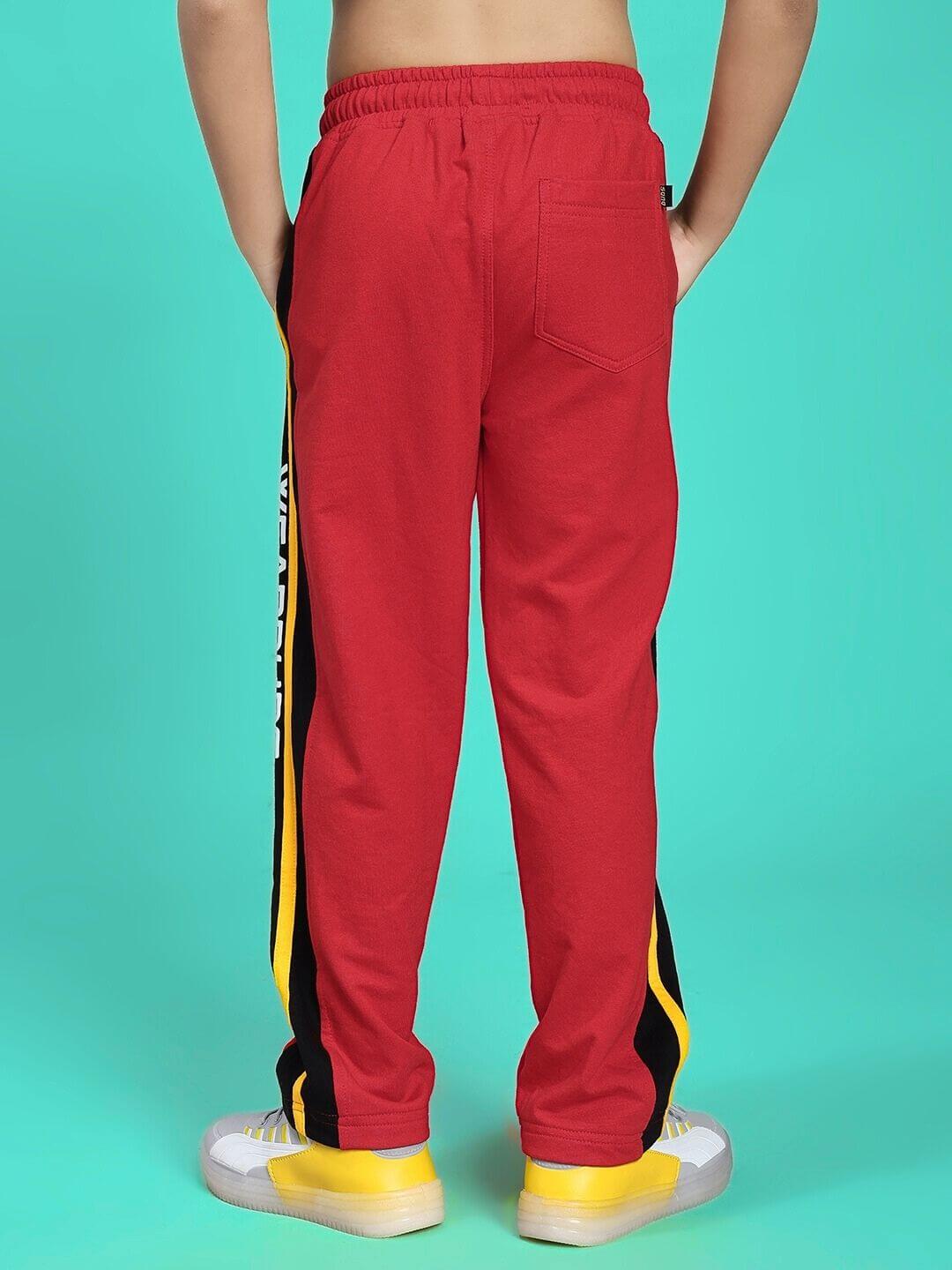 Alt Tag: Child wearing ROGER RELAXED-FIT JOGGER FOR BOYS AND GIRLS RED BLACK showing back view of stylish jogger pants.
