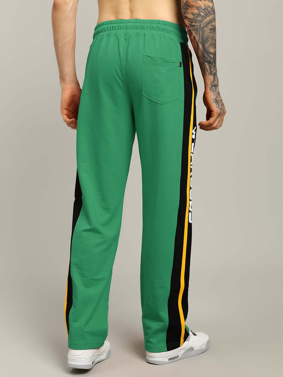Back view of ROGER RELAXED-FIT JOGGERS GREEN on model showcasing style and fit.