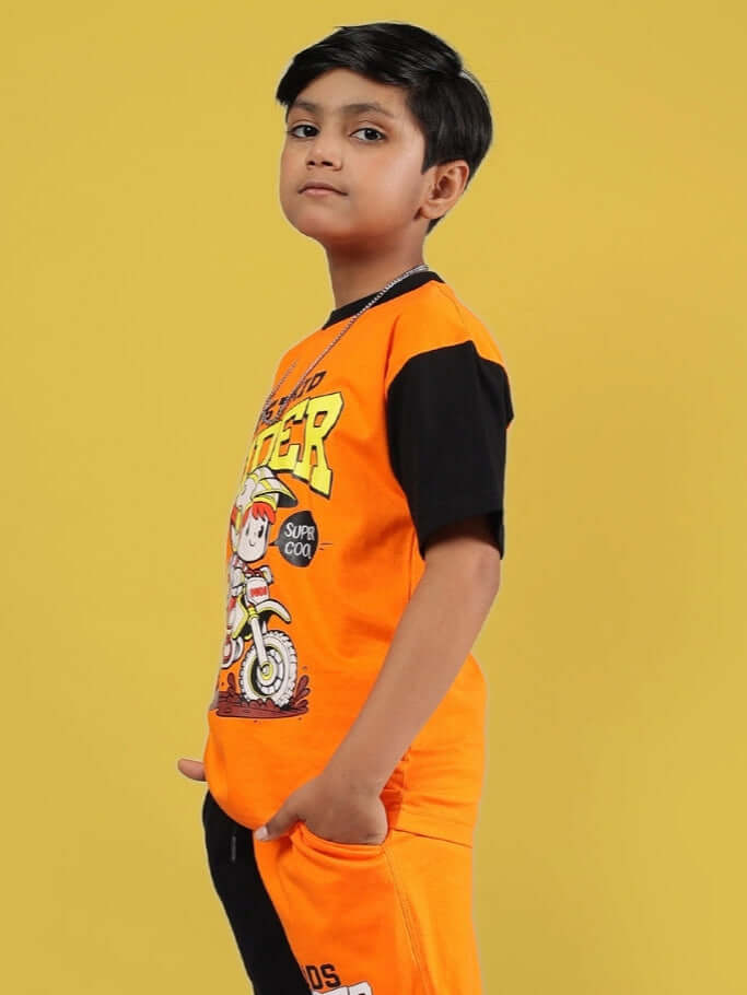 Child wearing Rogue Rider T-Shirt for Boys & Girls in Black-Orange, showcasing bold streetwear style