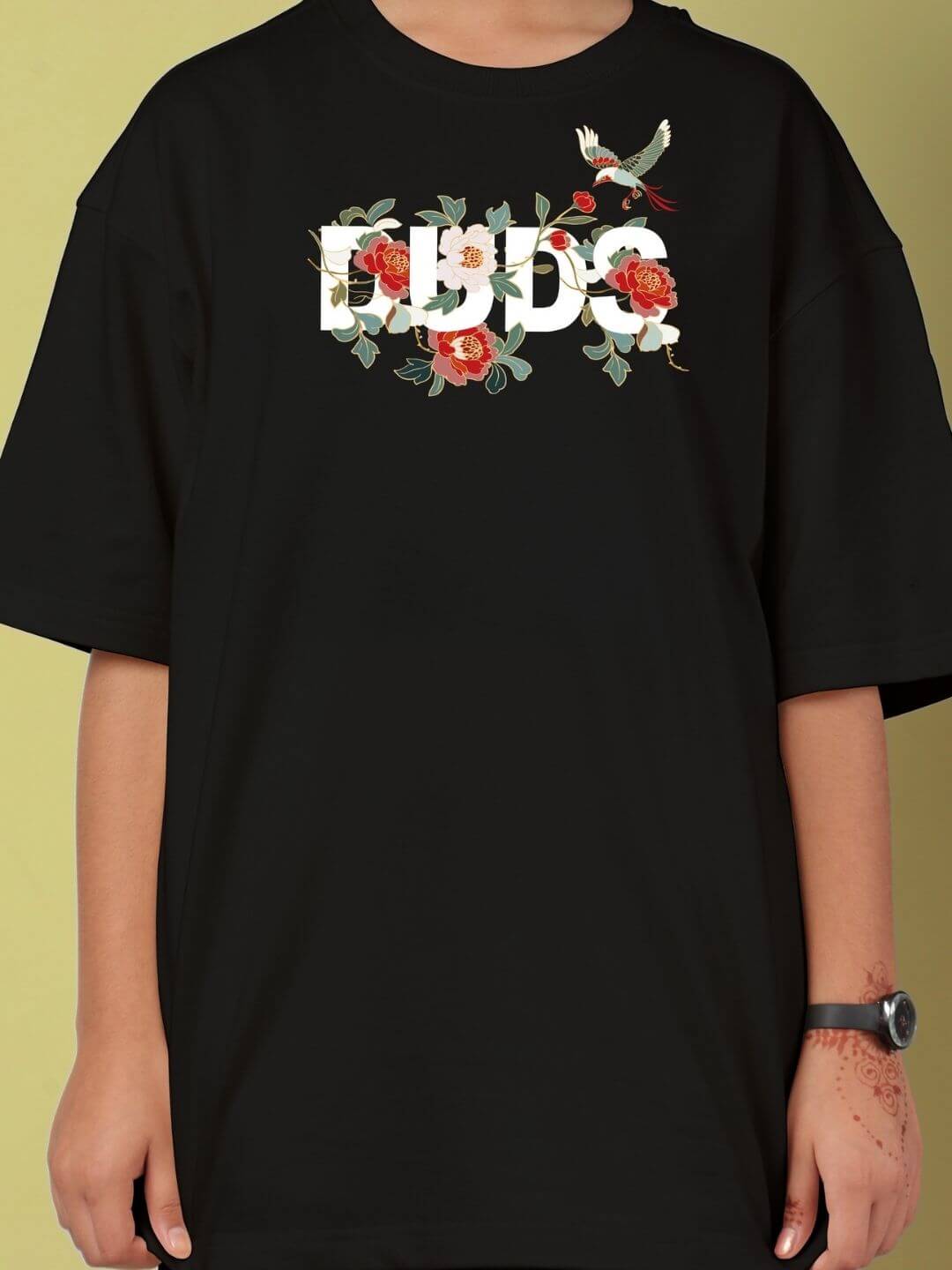 Child wearing ROSE CHARM CO-ORD FOR BOYS AND GIRLS BLACK t-shirt with floral graphic design