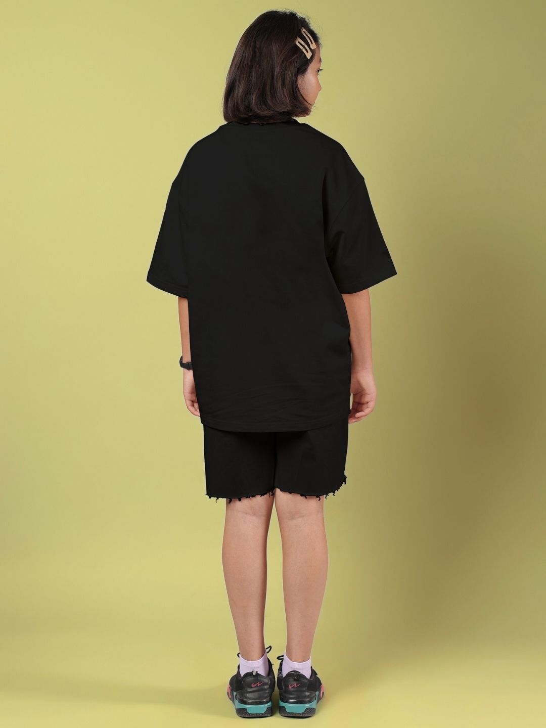 Child wearing ROSE CHARM CO-ORD FOR BOYS AND GIRLS BLACK, back view.