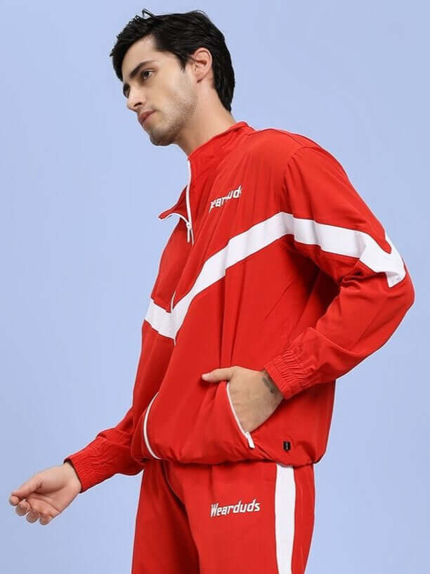 Man wearing ROYAL COMFORT RELAXED FIT JACKET RED, stylish casual outerwear with white stripes, perfect for elegance and comfort.