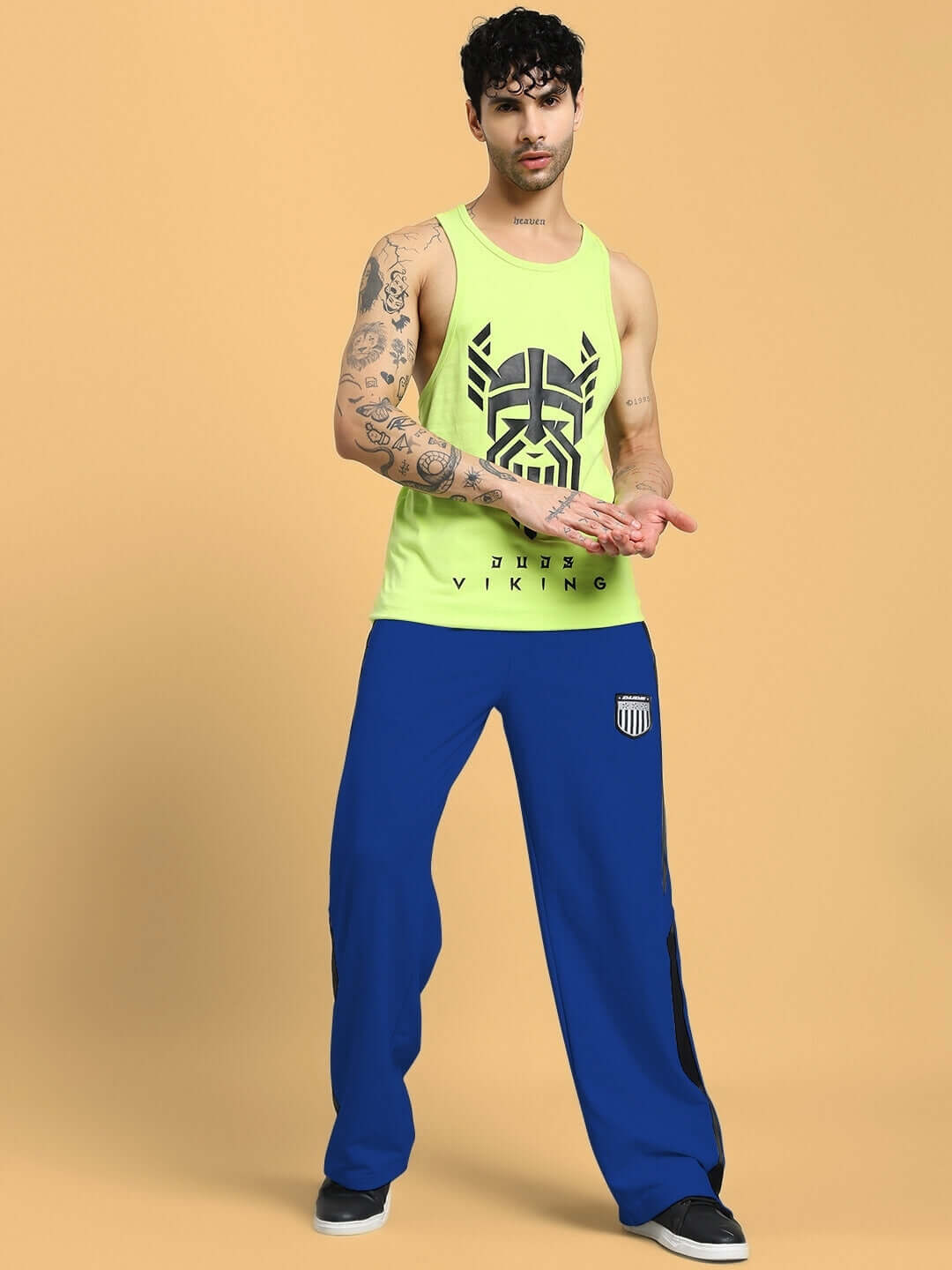 Man wearing Royalson Premium Joggers in blue, showing premium construction and comfortable fit perfect for activewear and leisure activities.