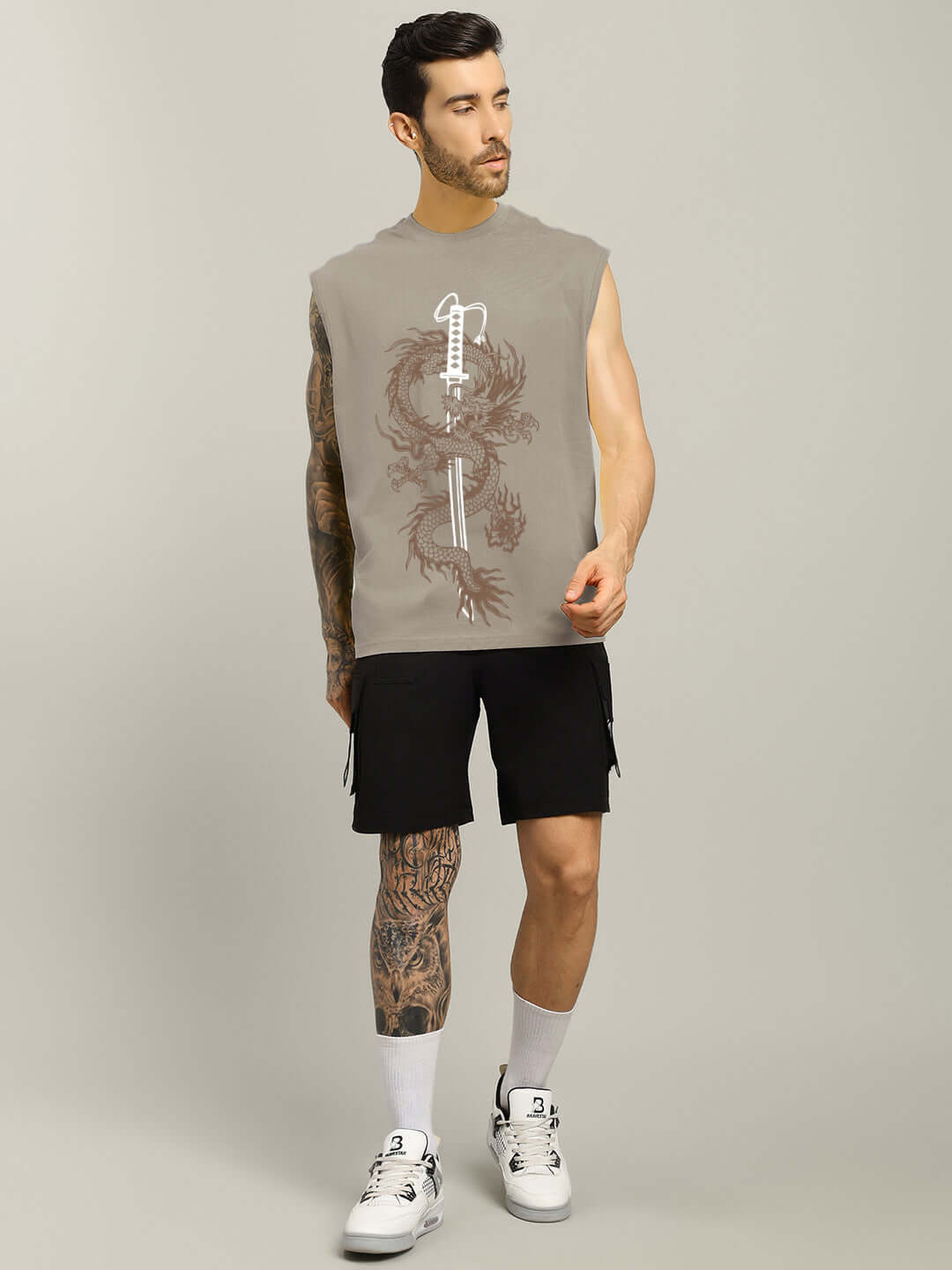 Man wearing Ryujin Kai grey printed gym t-shirt with black shorts, showcasing dragon design. Custom Fit option available. Stylish and modern.