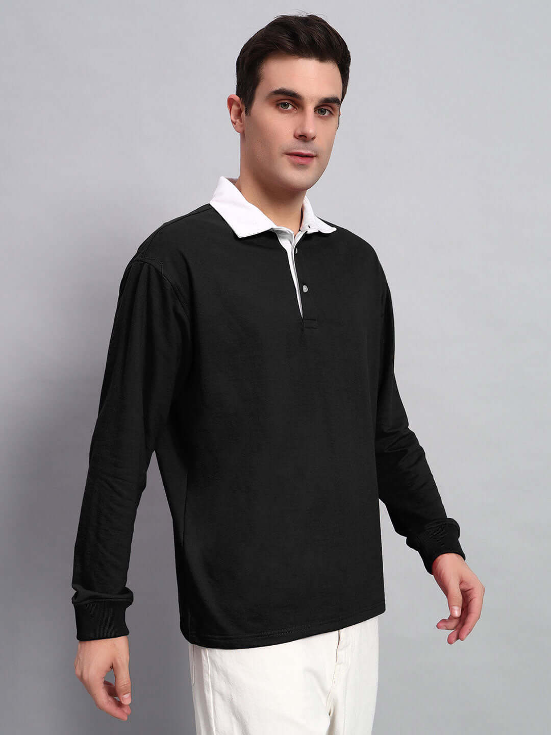 Black SAGOL POLO oversized sweatshirt made from premium cotton French terry with white collar detail, perfect for stylish casual wear.
