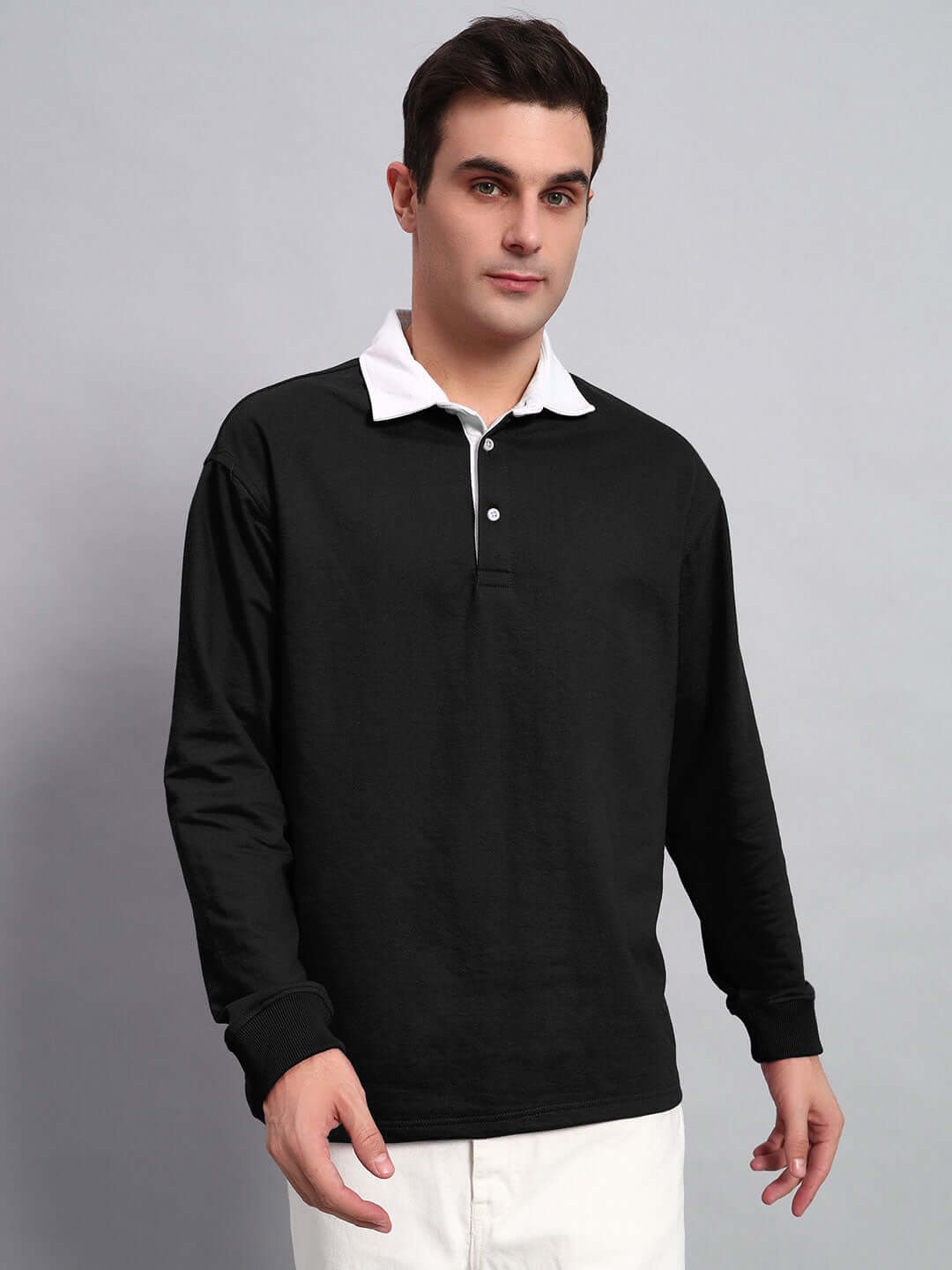 SAGOL Polo Oversized Black Sweatshirt with long sleeves and white collar, made from premium cotton fabric.