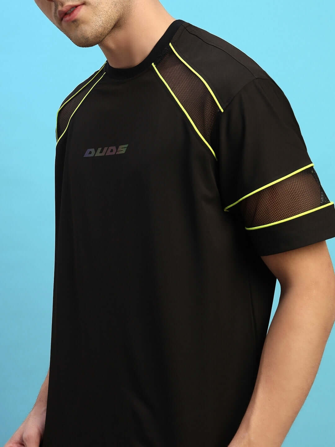 Black Salvo Reflector Co-Ord Set made from premium sports polyester with yellow accents, ideal for stylish activewear.