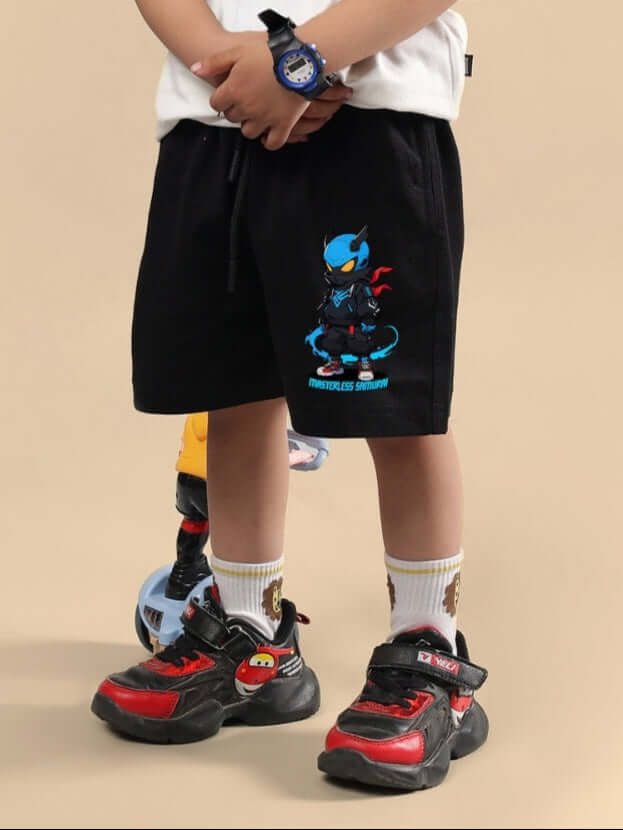Child wearing SAMURAI PRINTED SHORTS FOR BOYS & GIRLS BLACK with vibrant sneakers on beige background.