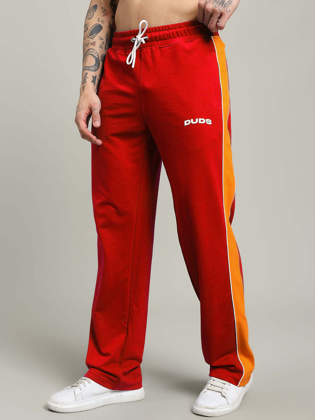 SANFORD STRIPE JOGGERS IN RED COLOUR featuring sleek side stripes and sporty design.