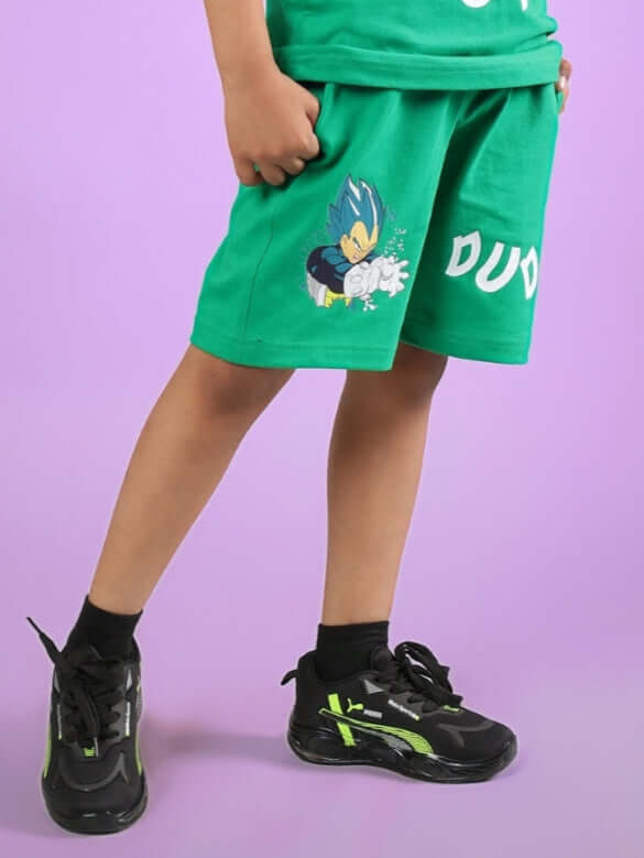 Child wearing SATORU SHORTS FOR BOYS & GIRLS GREEN with cartoon print, custom fit available, made by DUDS tailors.