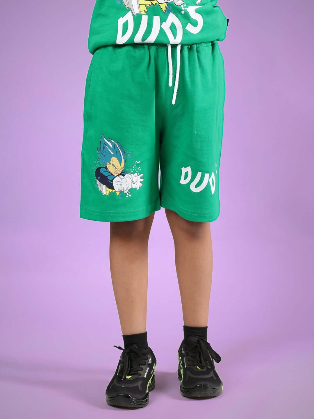 SATORU SHORTS FOR BOYS & GIRLS GREEN with DUDS logo, featuring a cartoon print, made-to-order, customizable size option available.