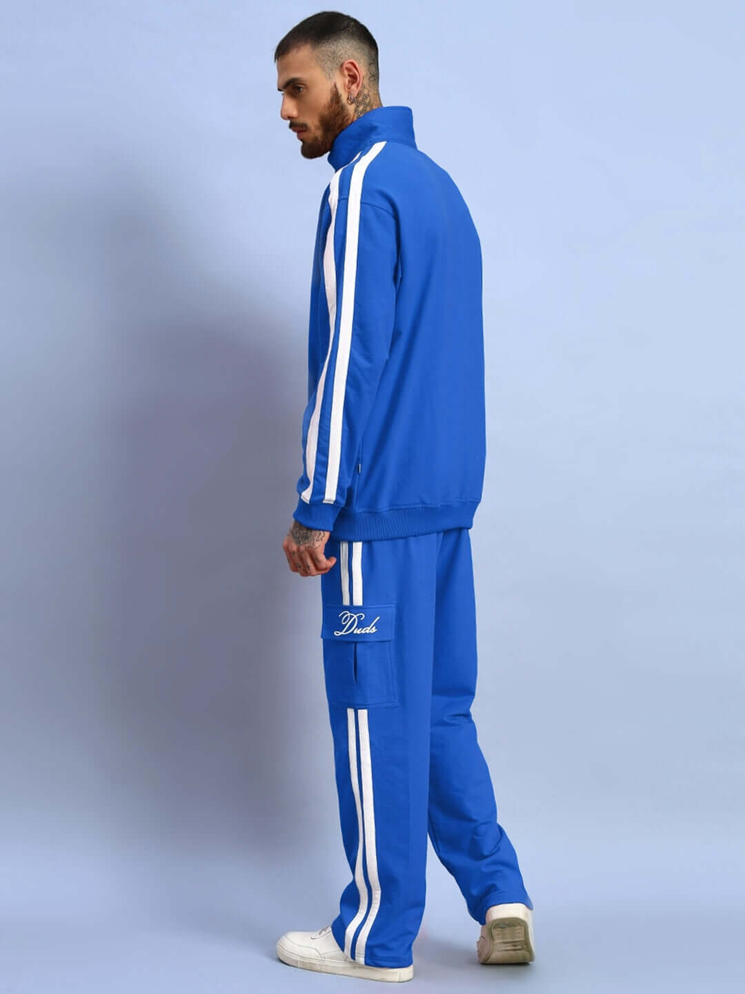 Man wearing WEARDUDS SCOTIA CO-ORD SET ROYAL BLUE made from premium 100% cotton terry fabric, side view.