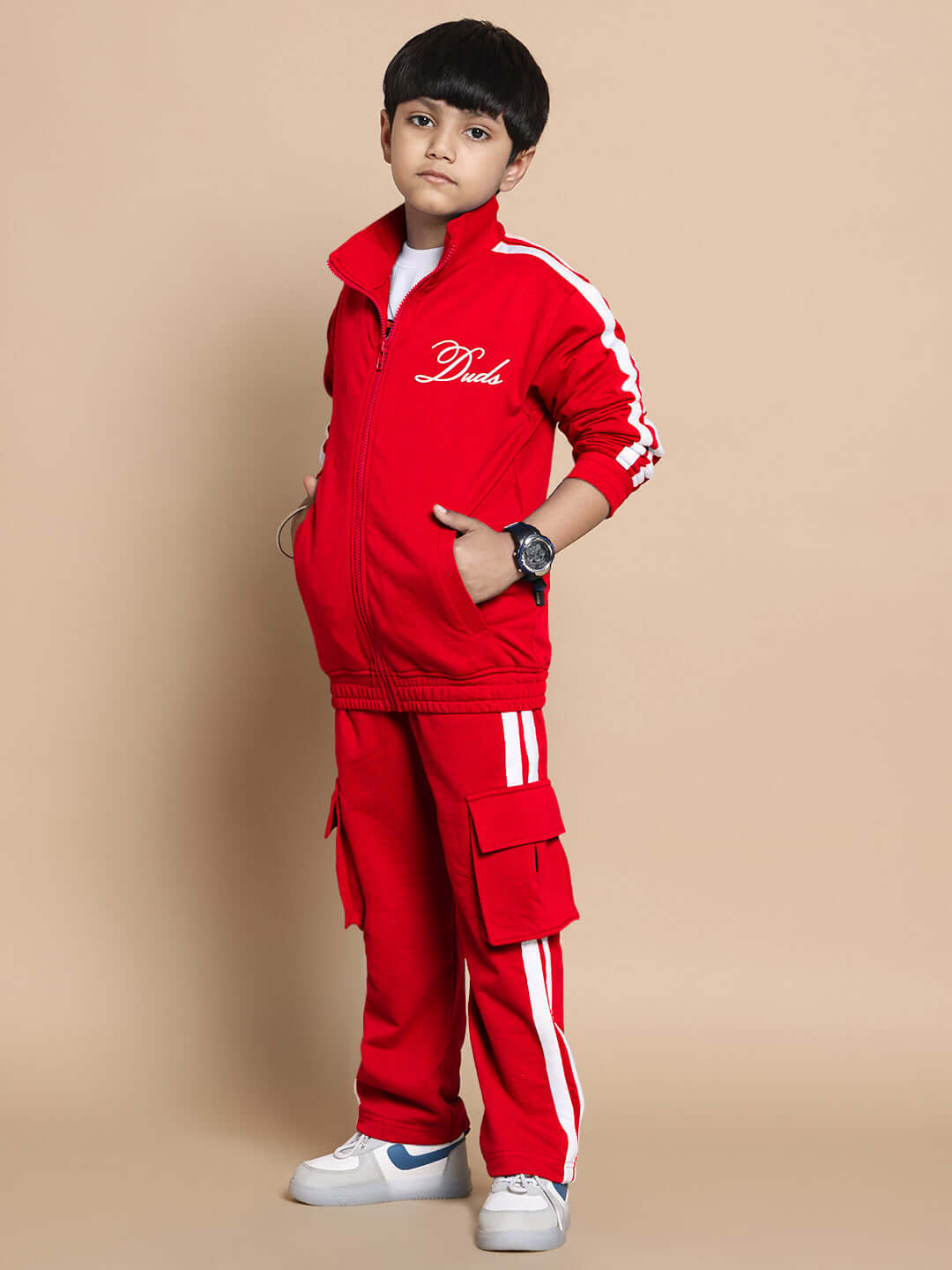 Child wearing red Scotia Co-ord Set, made from premium cotton terry fabric, suitable for boys and girls, designed by Color By Colours.