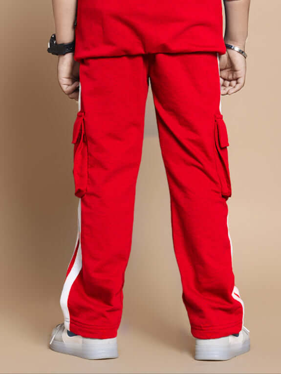 Rear view of a child wearing red Scotia Co-ord Set with cargo pockets, made from premium 100% cotton fabric. Ideal for boys and girls.