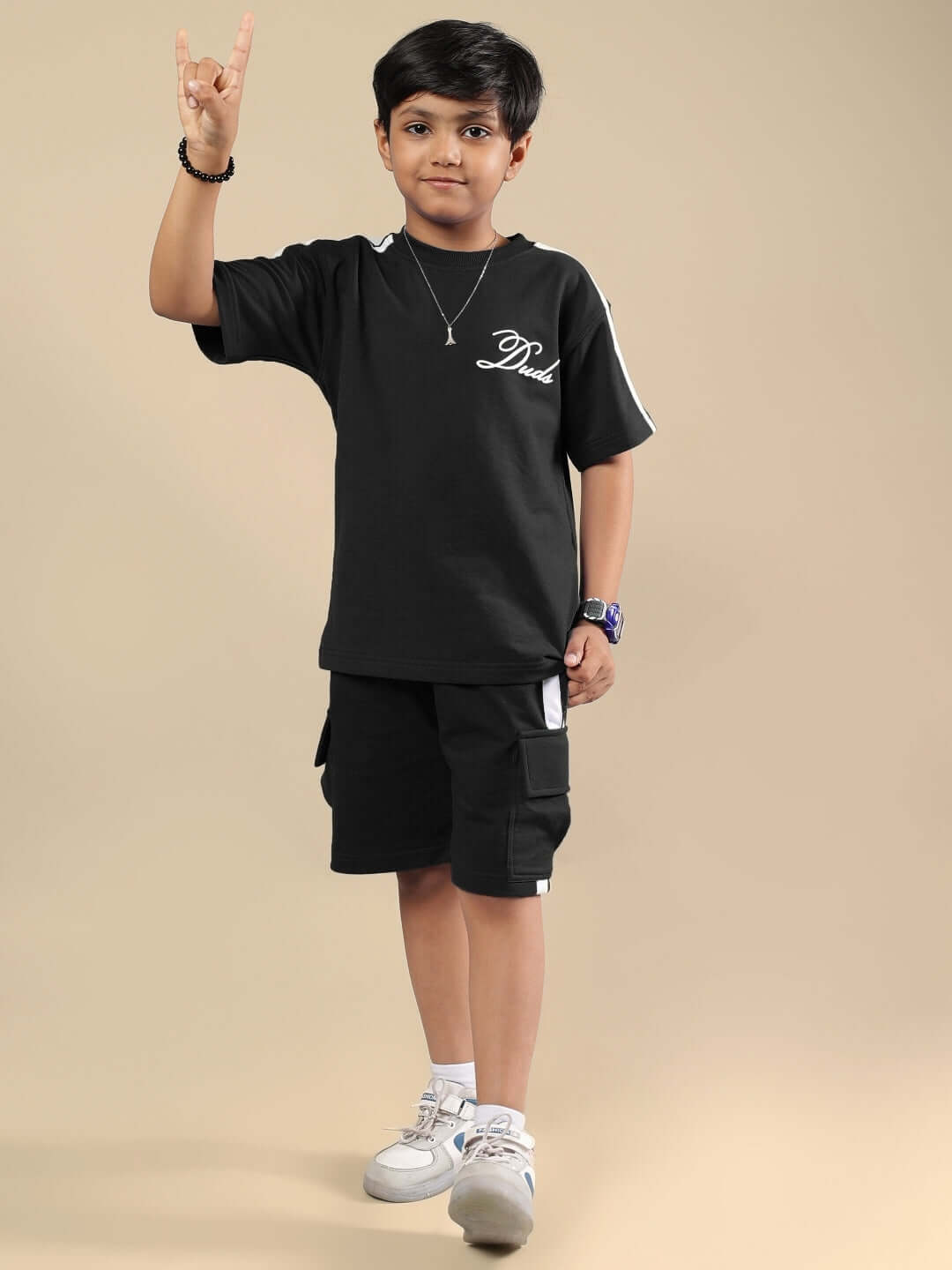 SCOTIA SUMMER CO-ORD FOR BOYS & GIRLS BLACK featuring custom-fit option by DUDS, model showcasing black t-shirt and shorts outfit.