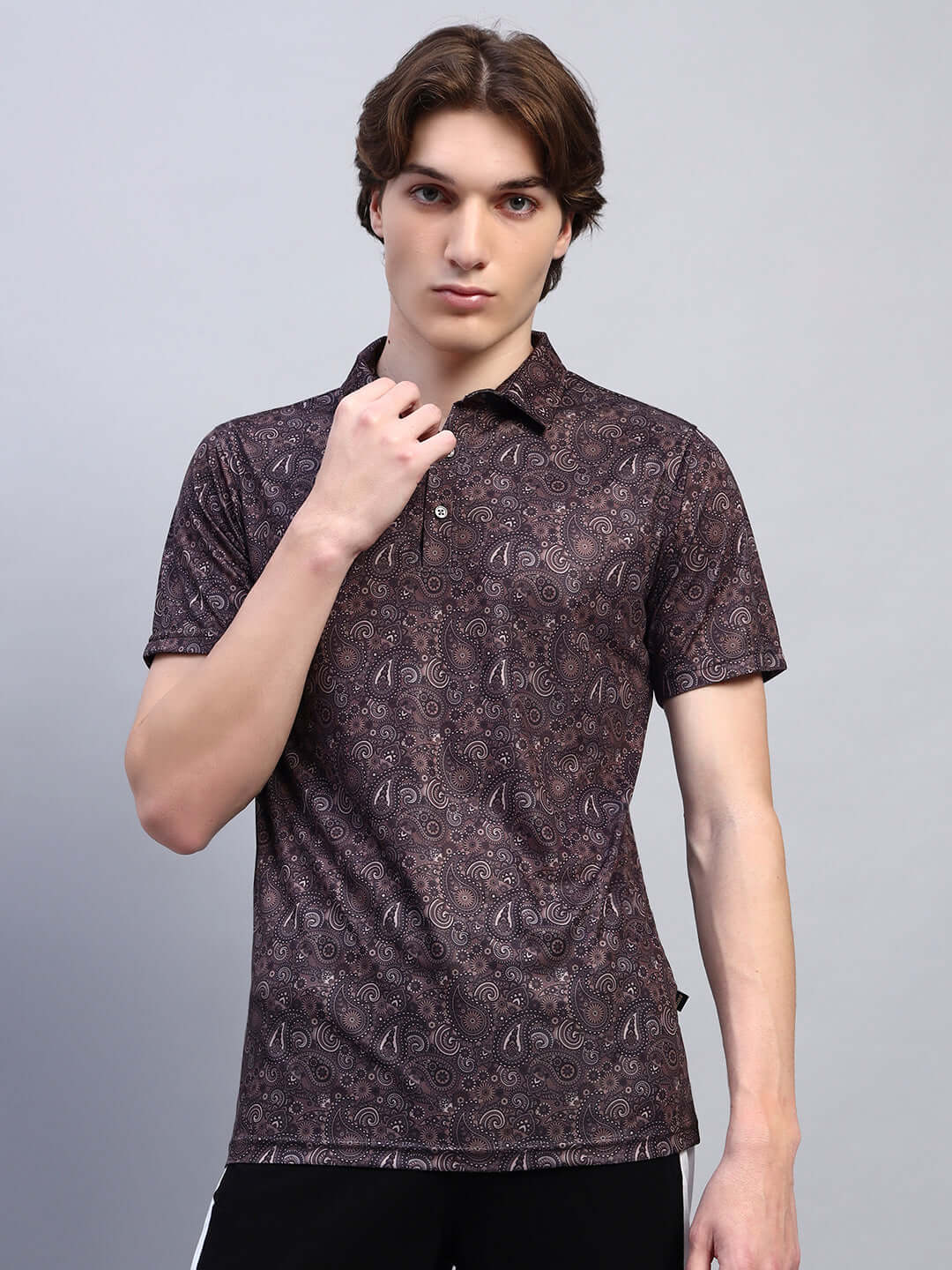 Brown Scottish regular fit t-shirt, sports polyester fabric, worn by male model, perfect for casual wear, Indian origin.