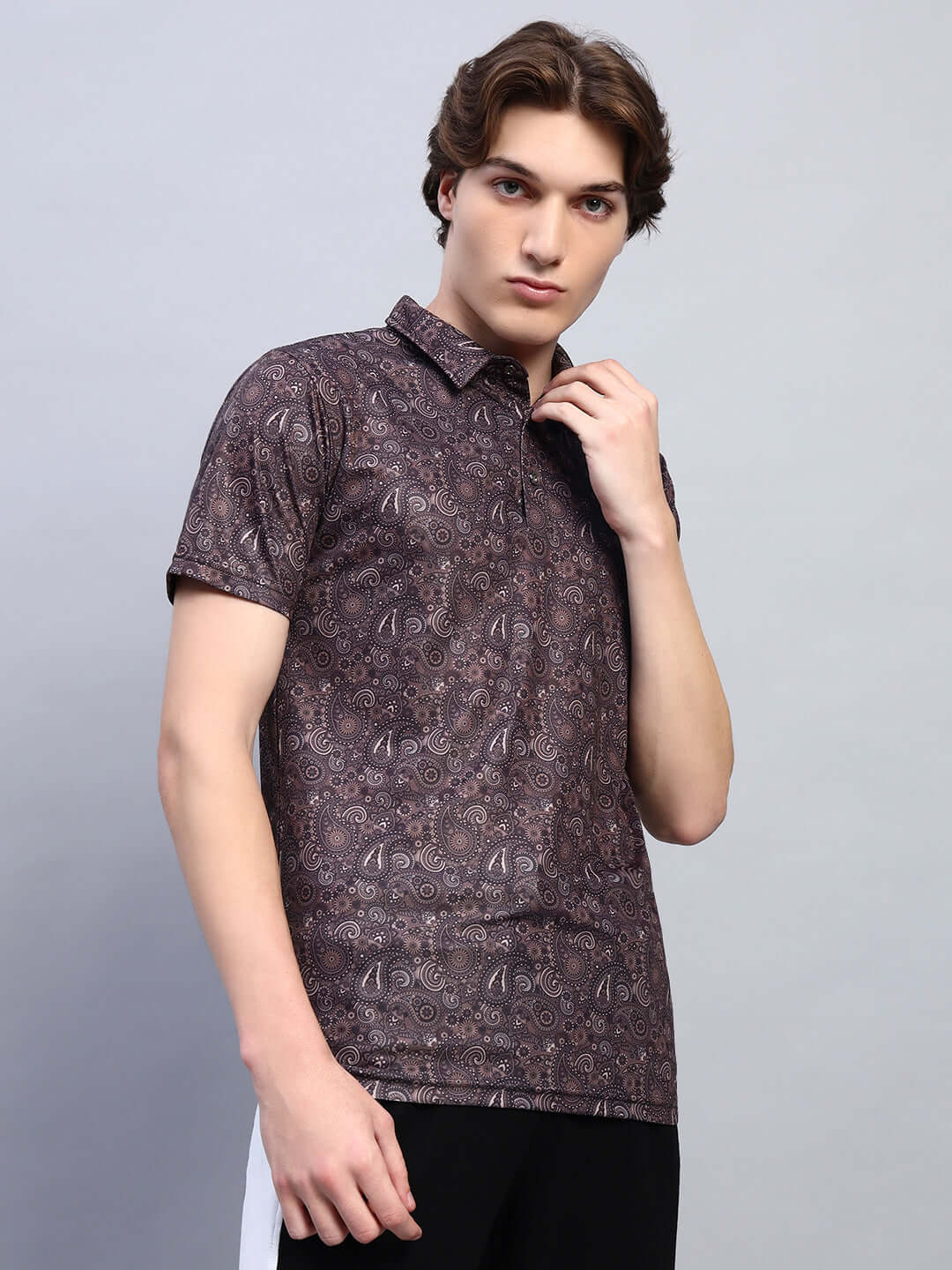 Man wearing Scottish regular fit brown t-shirt made of sports polyester fabric, stylish and comfortable, by Color By Colours.