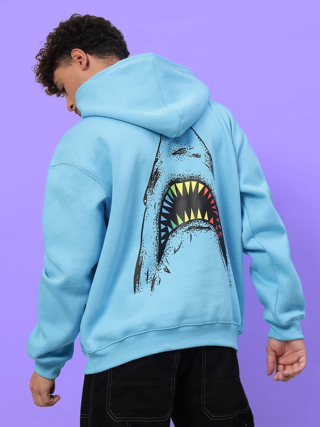 SHARKWAVE OVERSIZED FLEECE HOODIE LIGHT BLUE with shark design on back, worn by model