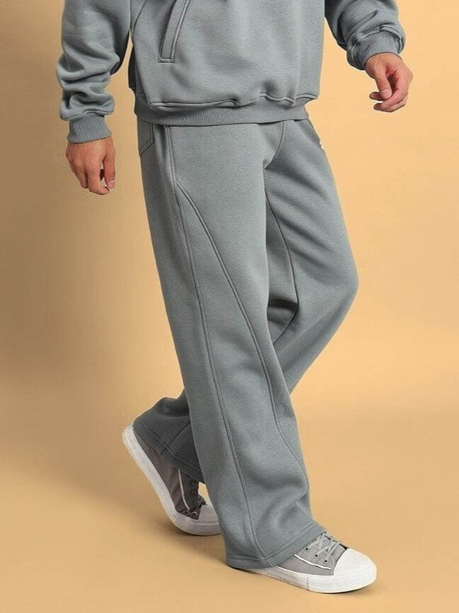 Person wearing SHOOTER COTTON FLEECE PANT GREY, showcasing comfort and style for workouts, lounging, or errands.