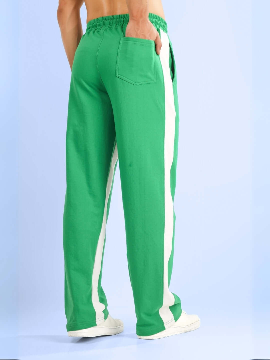 Back view of green side seam baggy jogger pants with relaxed fit, made to order by DUDS.