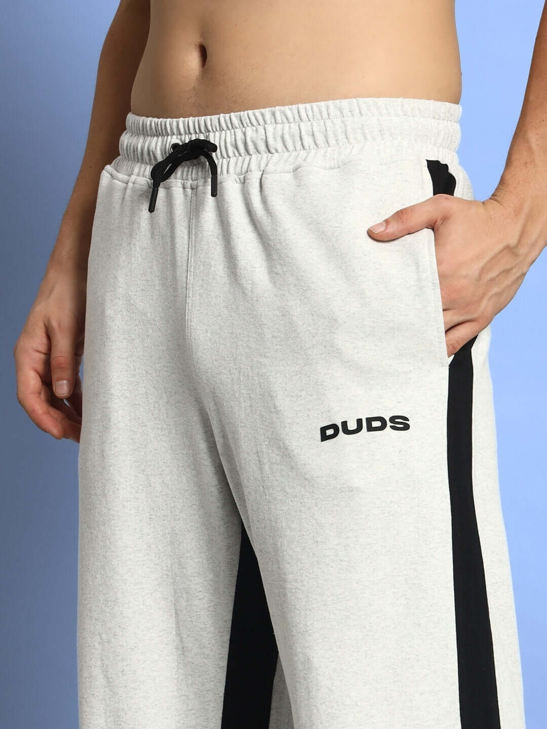 Side seam baggy joggers in melange grey-black by DUDS, featuring custom fit option. Made to order with experienced tailoring.