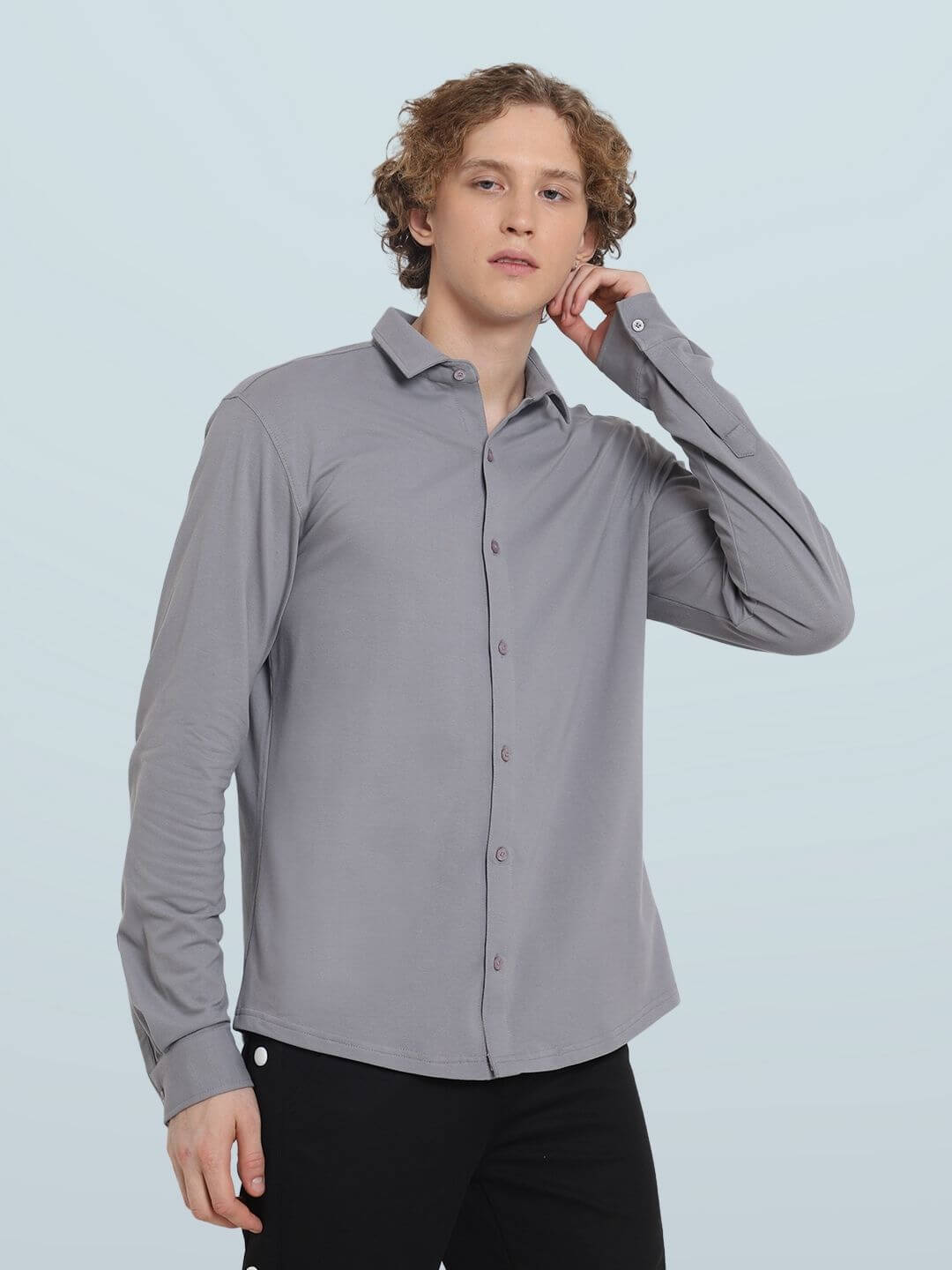Model wearing Silver Grey Sporty Pique Shirt, full sleeve, slim fit, curved hem, 100% cotton, wrinkle free, large size, comfortable for all day wear.