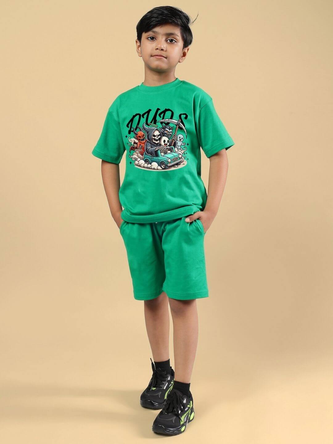Child wearing green Skeleton Rider Car Print Co-ord Set for boys and girls, showcasing a trendy skeleton car graphic and comfortable fit.