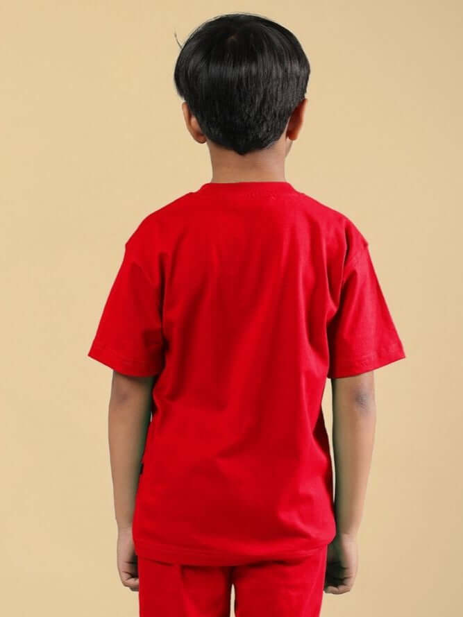 Boy wearing Skeleton Rider Car Print T-Shirt for Boys and Girls Red, rear view, highlighting vibrant red color and casual style.