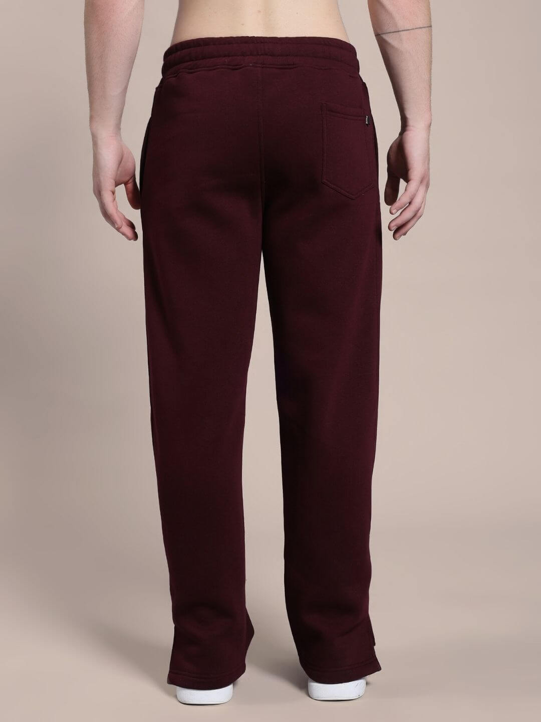 Back view of SKODA COTTON FLEECE JOGGER MAROON showcasing premium fabric and stylish design.