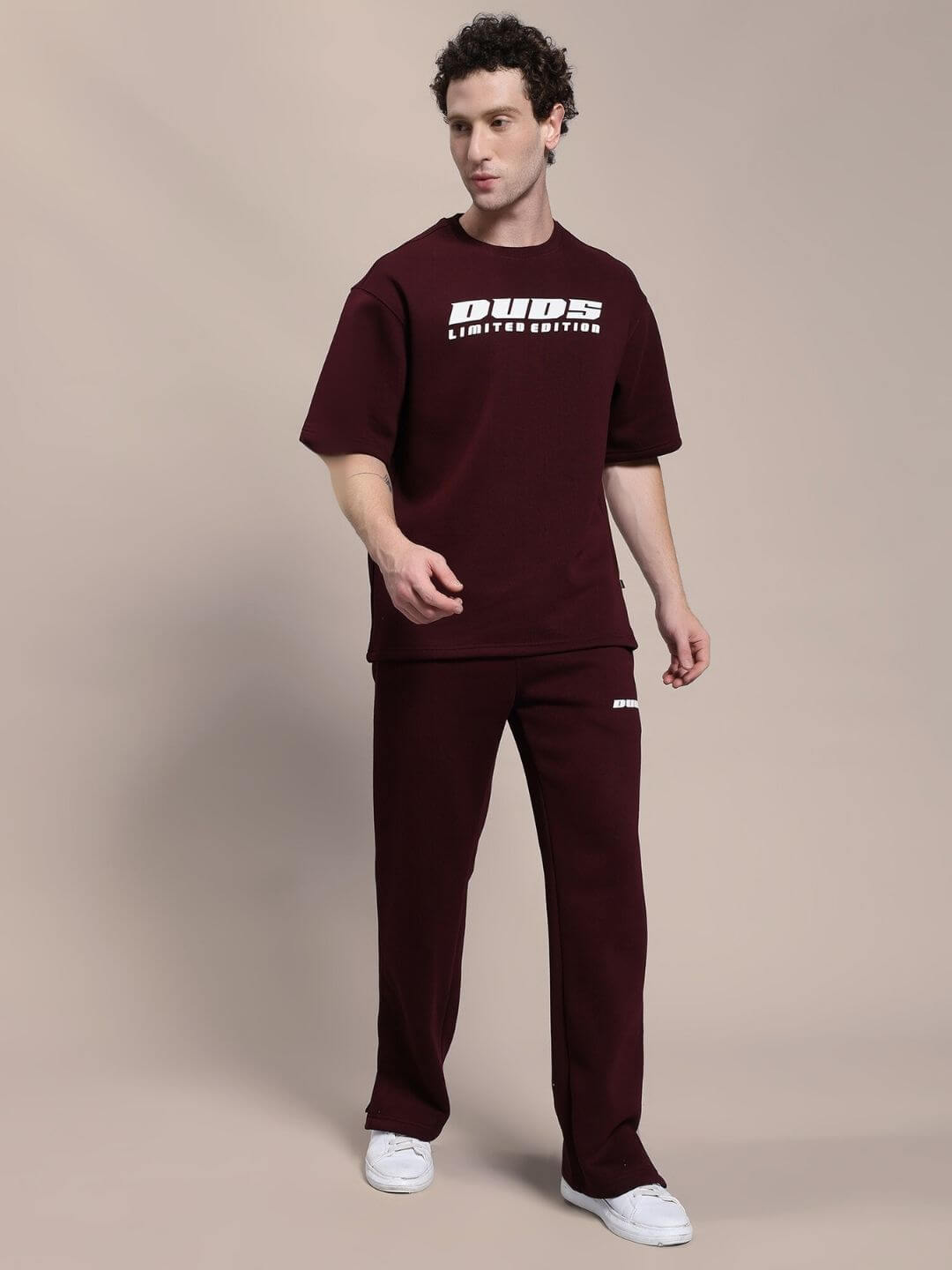 Man wearing SKODA FLEECE CO-ORD SET MAROON with matching hoodie and joggers, showcasing cozy and stylish casual wear.