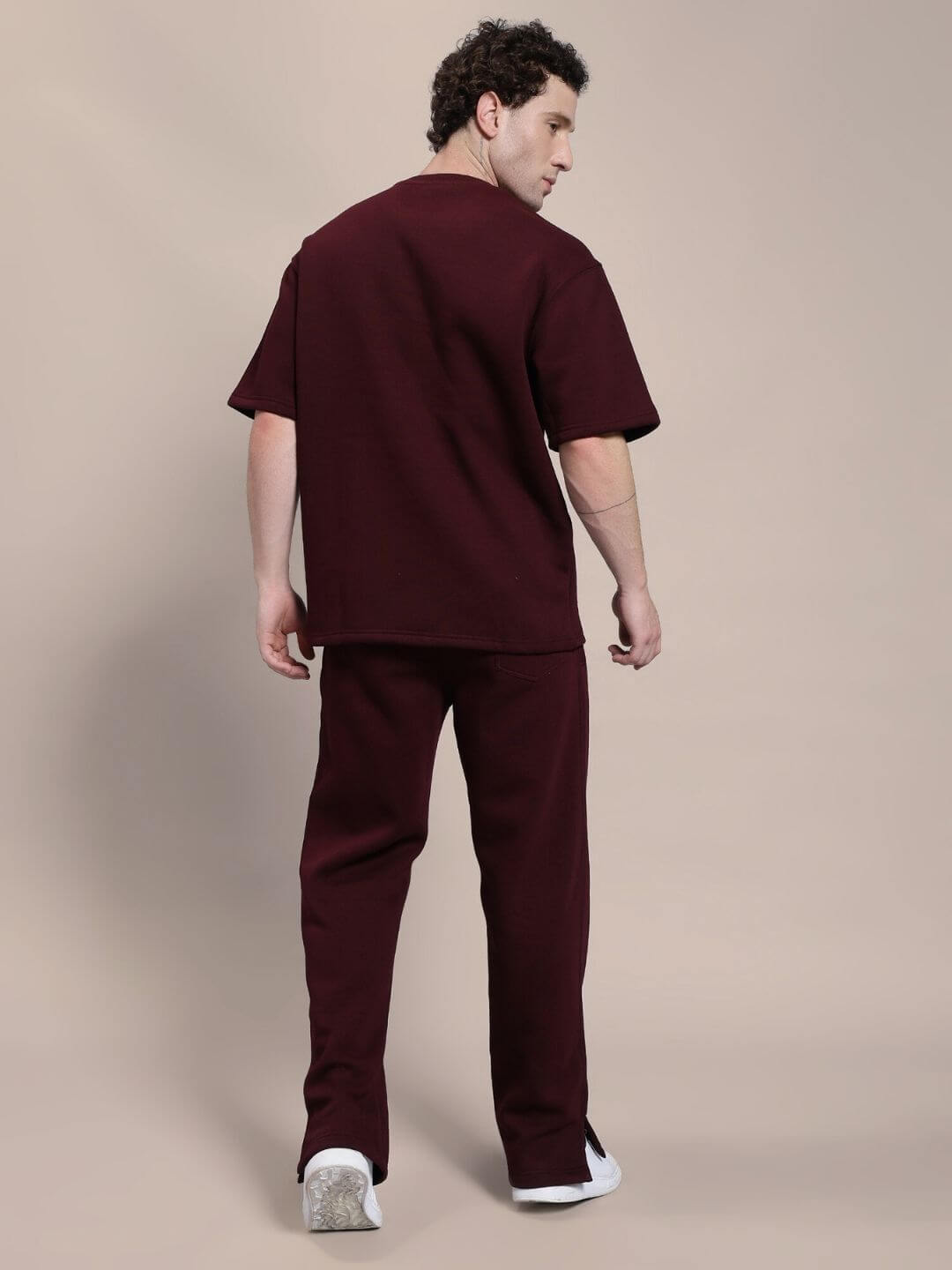 Back view of model wearing SKODA FLEECE CO-ORD SET MAROON showing soft fabric and comfortable fit.