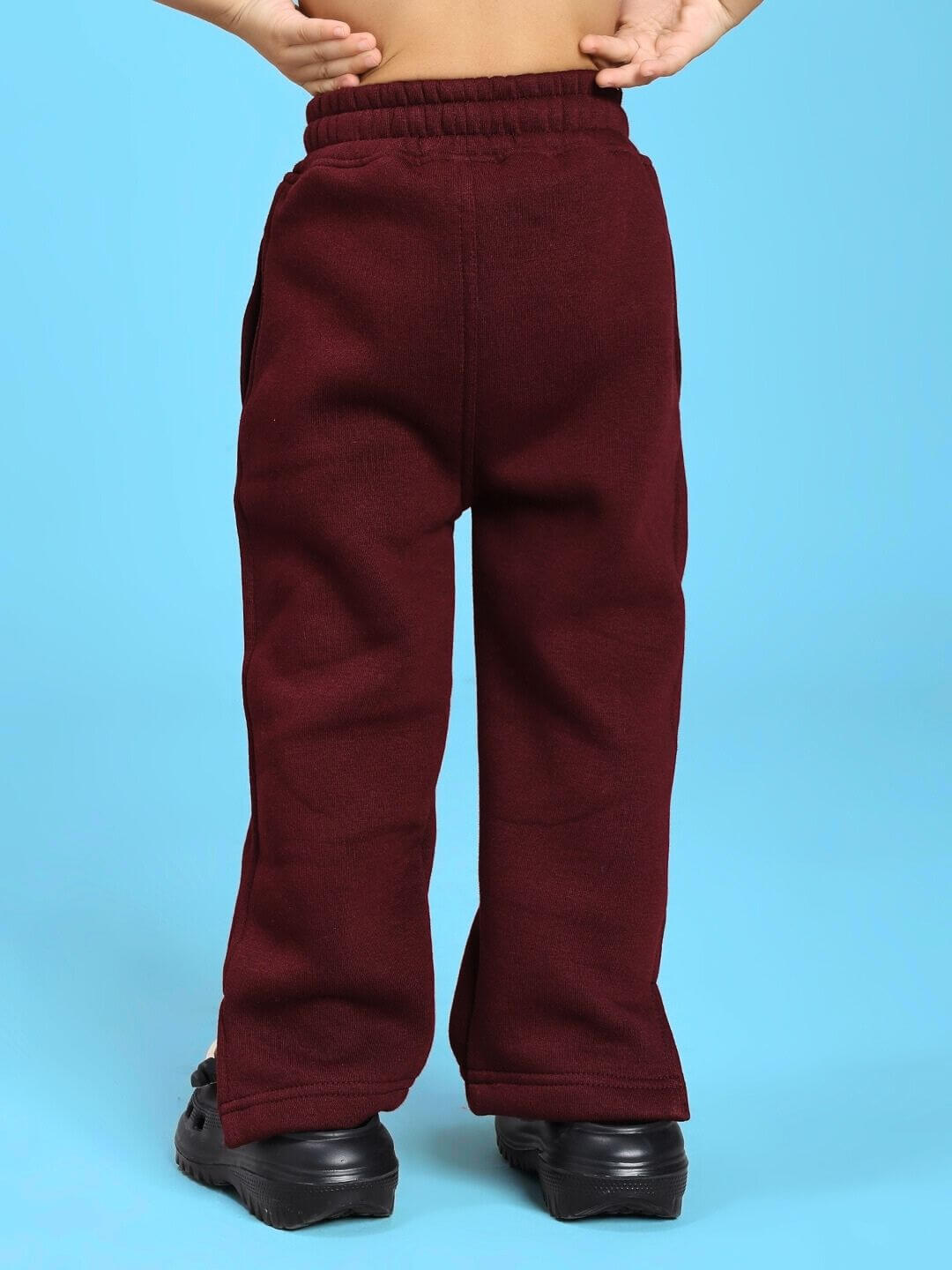 Back view of SKODA FLEECE JOGGER FOR BOYS AND GIRLS MAROON showcasing design and fit