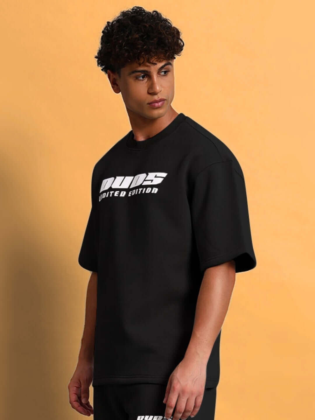 Man wearing WEARDUDS SKODA FLEECE CO-ORD BLACK, featuring a stylish black fleece set with logo. Ideal for custom fit options.