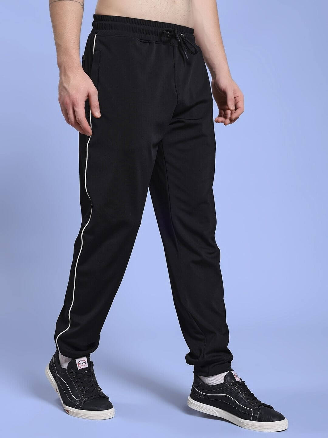 Model wearing SKY BOLT RELAXED FIT JOGGER BLACK with a relaxed silhouette and modern streetwear design.