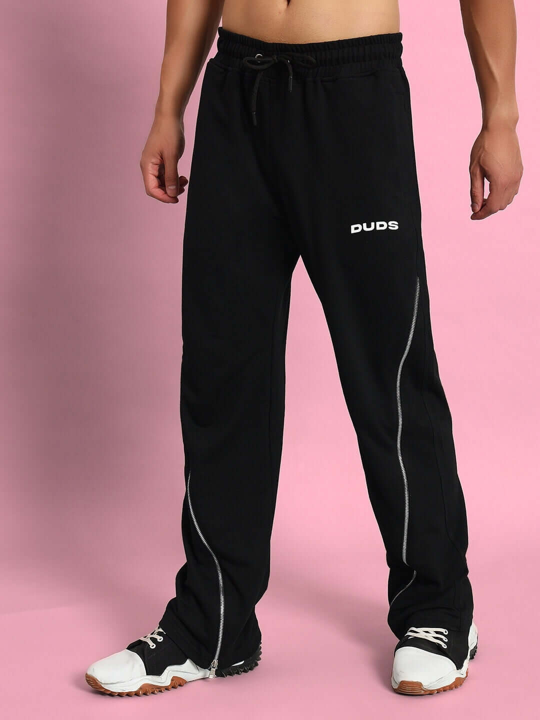 Black slider joggers by DUDS, made to order with customization option, featuring a comfortable and stylish design for active lifestyle.