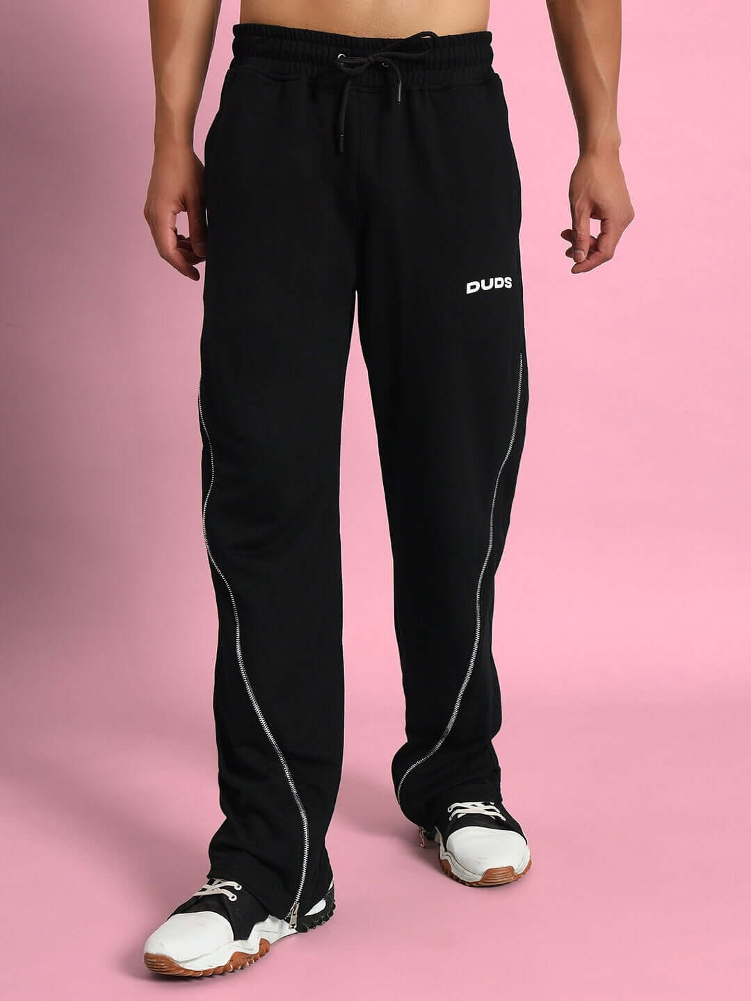 Man wearing black Slider Joggers by DUDS, featuring custom fit options and experienced tailoring.