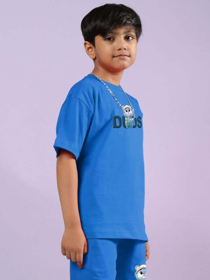 Child wearing SMILEY BEAR T-SHIRT FOR BOYS AND GIRLS BLUE, featuring a cheerful design ideal for everyday comfort and style.