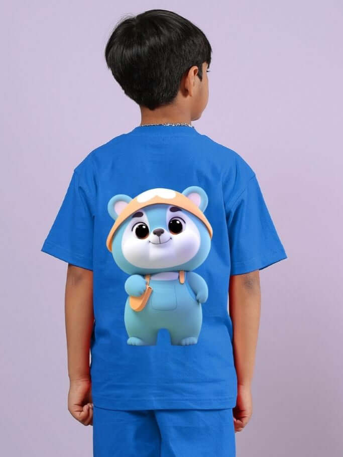 Child wearing SMILEY BEAR T-SHIRT FOR BOYS AND GIRLS BLUE with a cartoon bear design on the back, showcasing vibrant color and playful style.