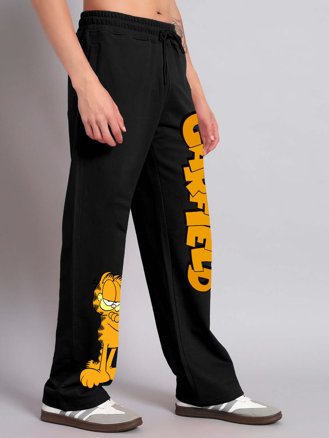 SMUG GARFIELD relaxed fit joggers in black with cartoon graphic detail, perfect for casual and comfortable wear; made-to-order by DUDS.