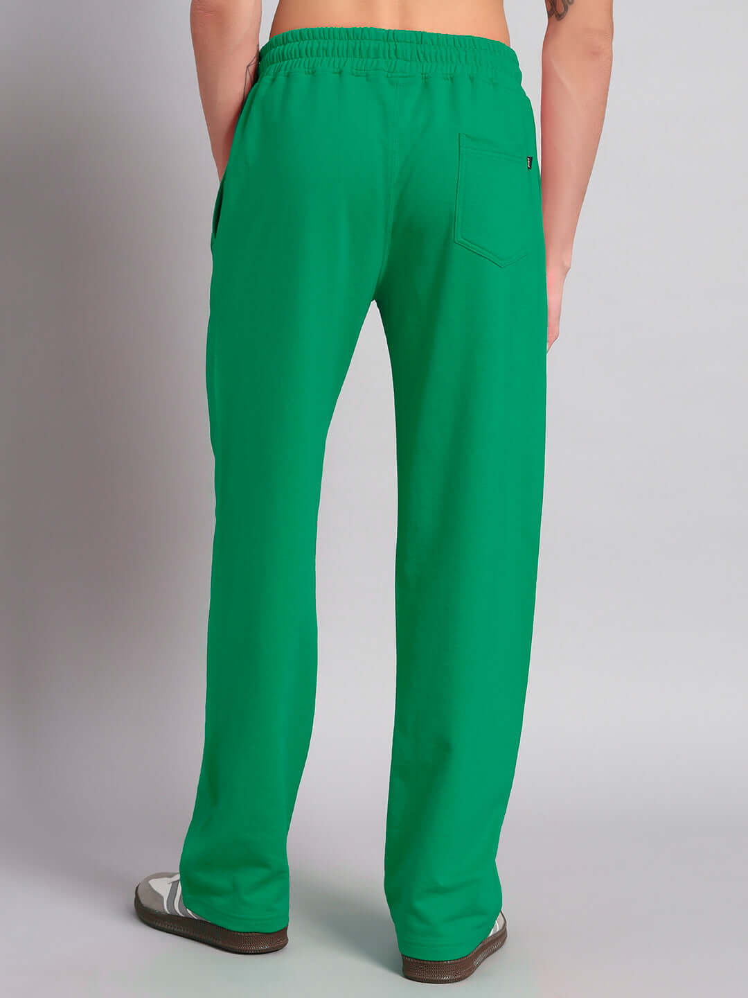 Man wearing SMUG GARFIELD Relaxed Fit Jogger in green, showing back pocket and comfortable fit.